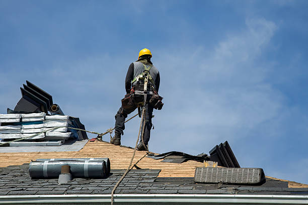 Professional Roofing technician working in Lansing, KS